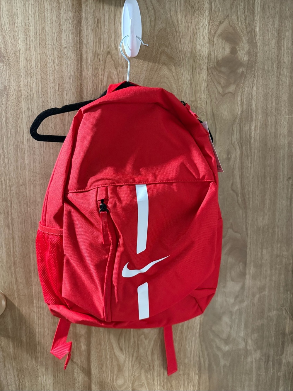 Nike Red Backpack with White Swoosh and Stripe